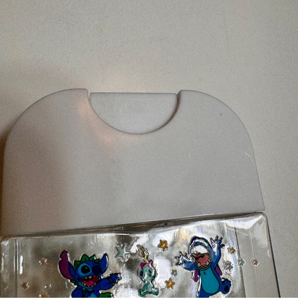 Handmade hand sanitizer spray bottle featuring lilo and Stitch - Picture 10 of 11